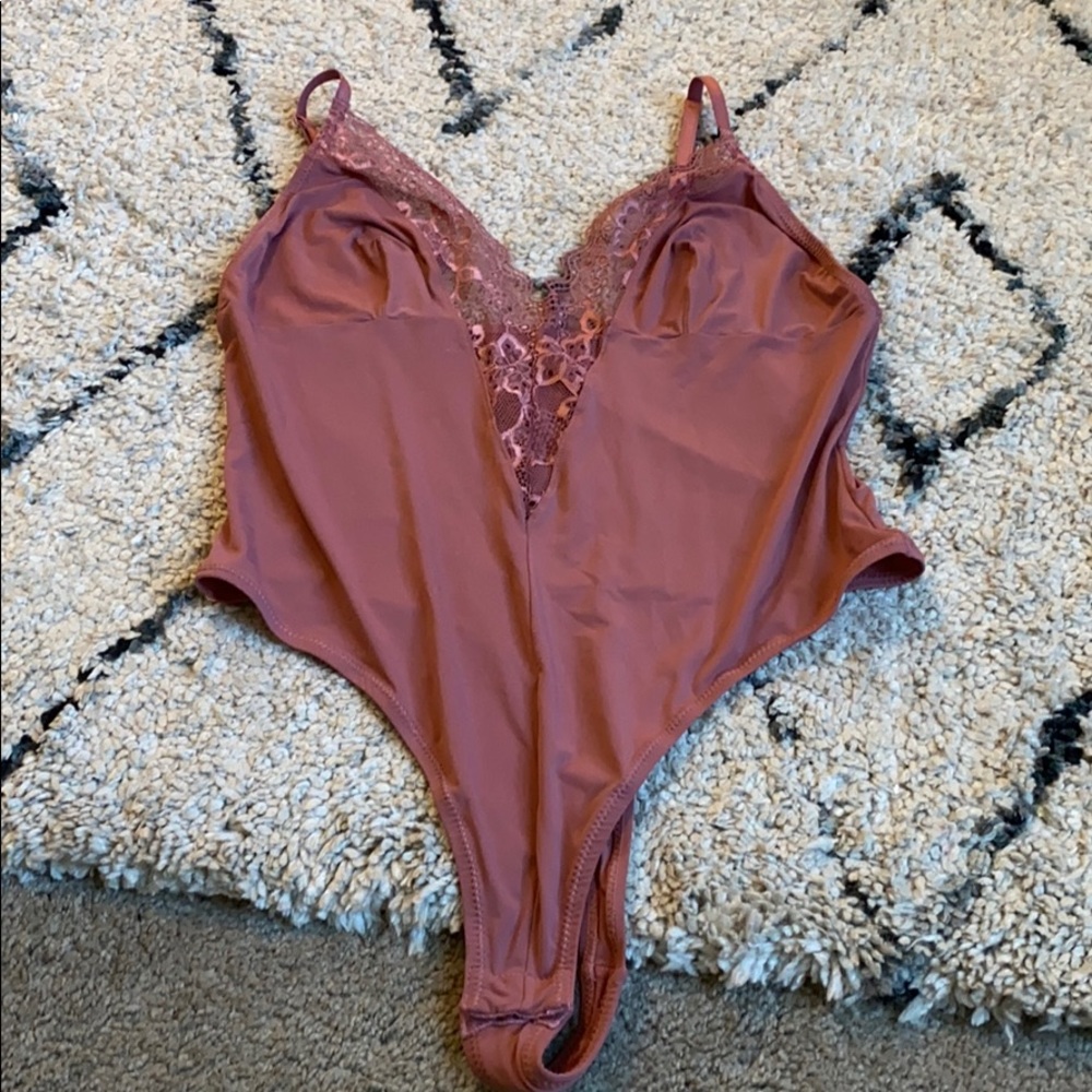 Pink bodysuit